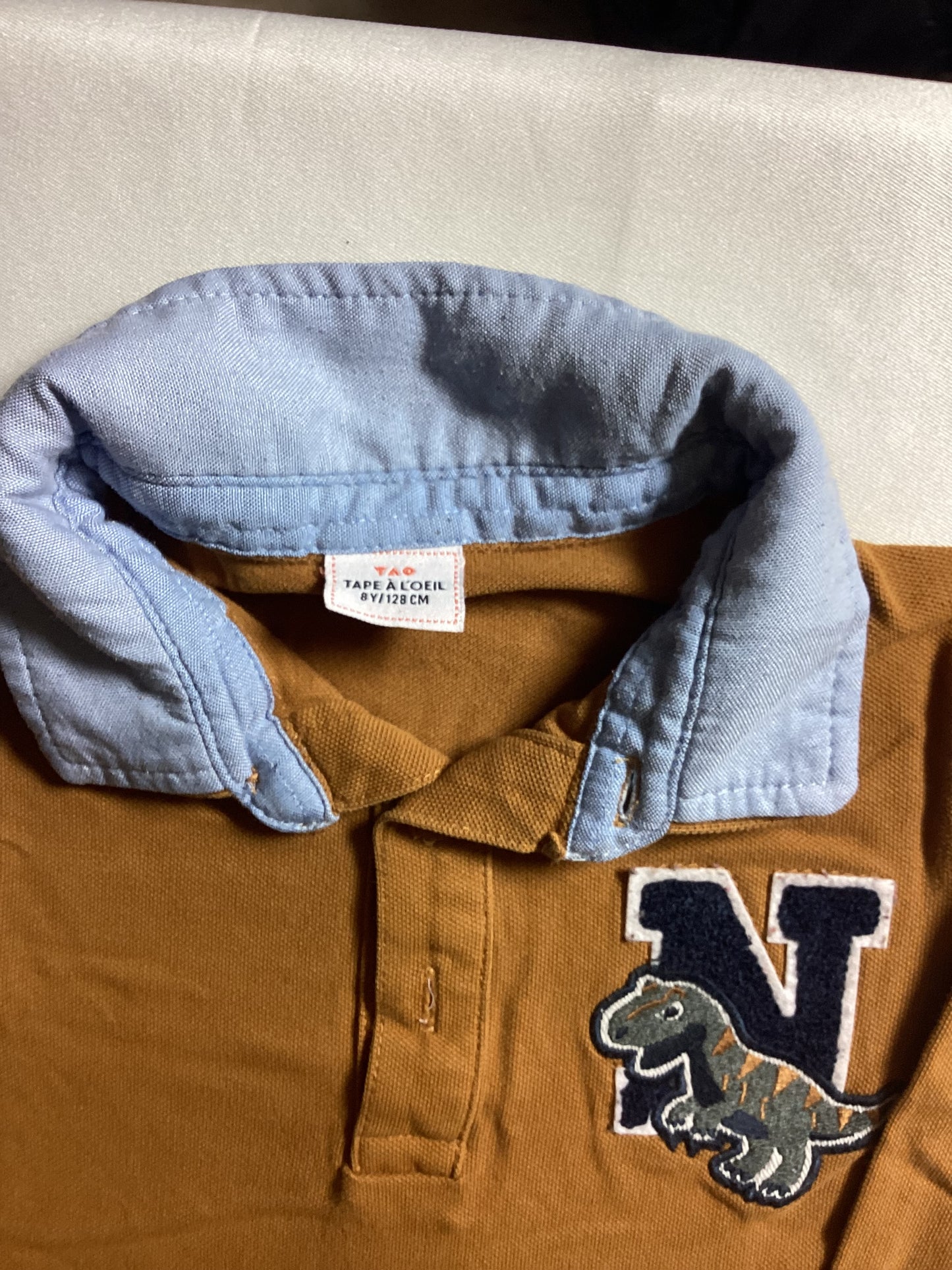 Polo effet chemise 8 ans